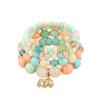 Bohemian Ethnic Style Layered Beaded Bracelet Set with Elephant Pendant and Stackable Crystal Accents