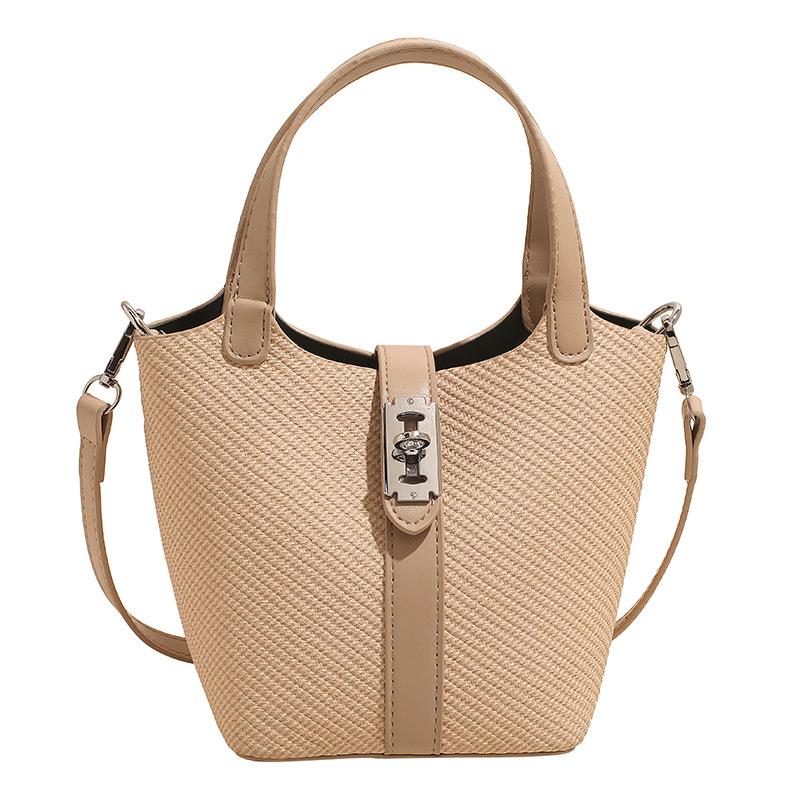 Korean version of casual high-quality temperament simple portable bucket bag women's versatile commuter messenger bag bag