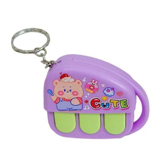 

Mini Cartoon Piano Keychain with Voice Recorder Creative Music Box Toy Pendant for Bags Backpacks Novelty Gift for Kids Teens Fun Party Favor Grab фиолетовый