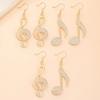 Golden Music Symbol Earrings Dangle Design for Music Lovers - Delicate & Unique Fashion Accessory