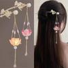 Luminous Lotus Lantern Tassel Hairpin: Ancient Style Retro Hanfu Hair Accessory for Women.