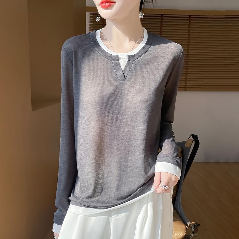 A Multicolored Knitted Sweater A Summer Thin Long-sleeved T-shirt Is Worn Over A Top As A Base Layer