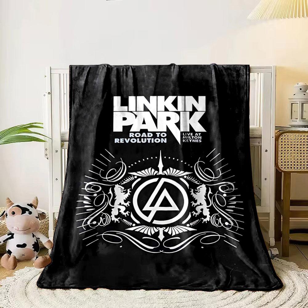 

A symmetrical logo with ornamental lions, wings, and an LP symbol. for all seasons blanket lunch break throw gift 80cm x 120cm