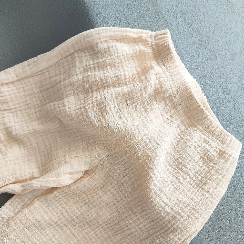 Pantaloni estivi per bambini coreani, casual, in cotone e lino, tinta unita, larghi e plissettati, pantaloni harem a vita alta per ragazze.