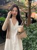 Women's Stylish V-Neck Sleeveless Summer Dress: Loose Fit, Slimming, Solid Color, Short Skirt - New Fashion Collection.