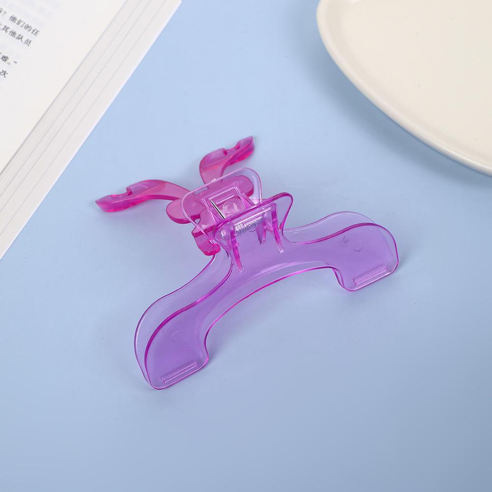 

Прозрачный пластиковый зажим для книги Простой помощник для чтения Фиксированный держатель для книги Закладки Креативный дизайн Практичный держатель для заметок для книжного магазина 1PCS фиолетовый