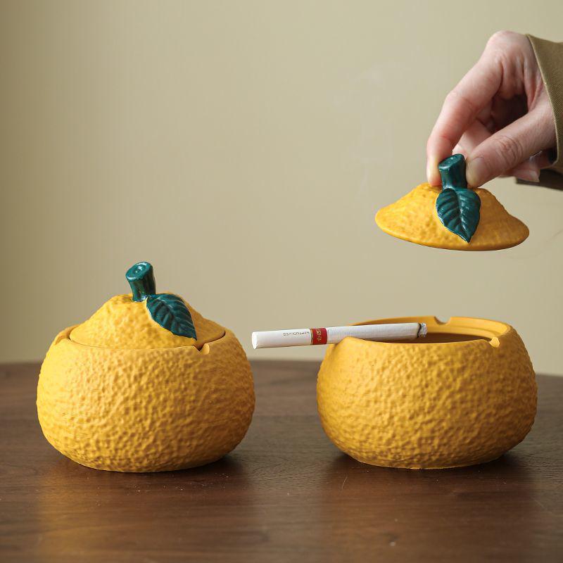 Resin Orange Ashtray with Lid - Creative, Anti-Fly, Stylish Living Room or Office Decor.