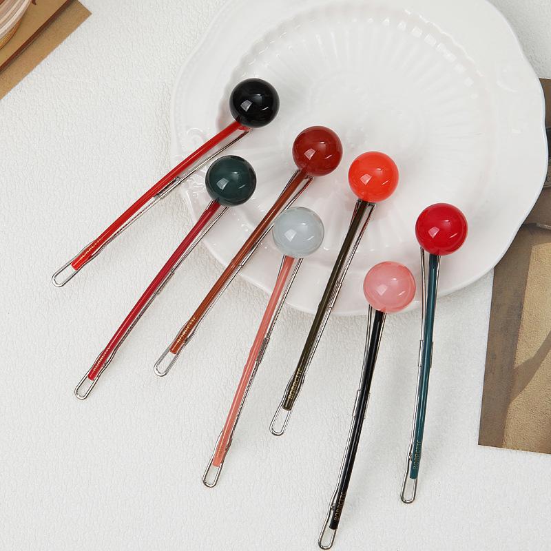 2024 Trend: Round Ball Acrylic Lollipop Hair Clip – Simple, Celebrity-Style Accessory