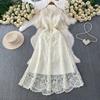 Elegantes O-Ausschnitt Langarmkleid mit Blumenstickerei und Spitze für Damen Sommer Ausgeschnitten mit Quasten Detail Unifarben Mode Roben