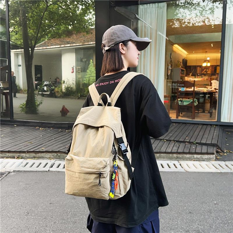 Schoolbag trendy brand pleated backpack women's 1011 new lightweight fashion schoolbag large capacity leisure travel backpack men