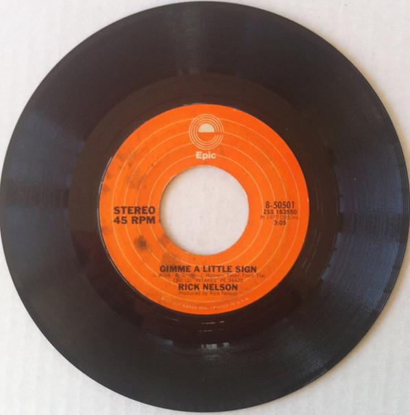 

7inch Record RICKY NELSON - Gimme A LIttle Sign 850501 Epic 1977 US Rock Used