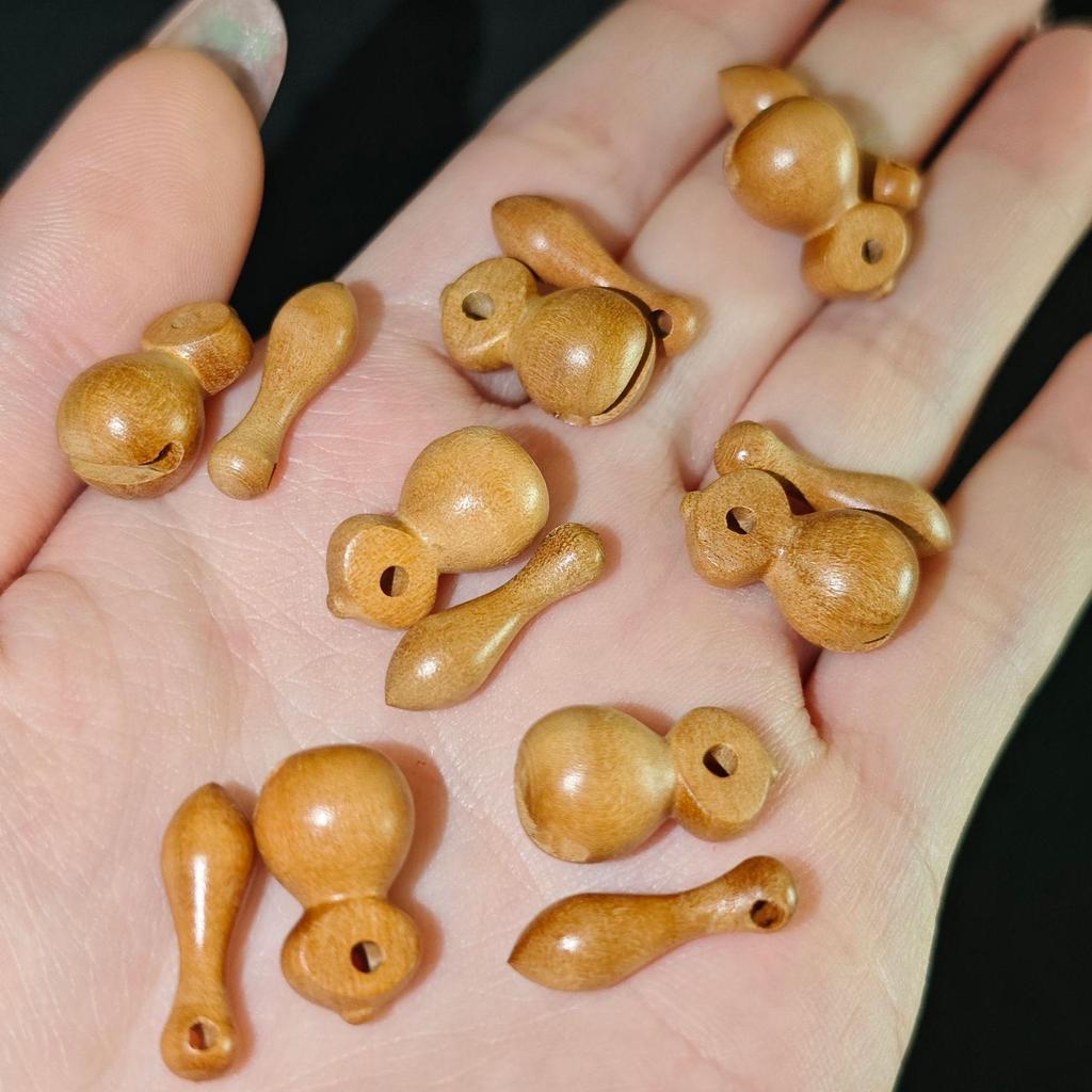 Mindful Peach Wood Fish Beads Bracelet with Carved Wooden Pendant