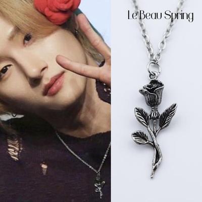I.M Wearing Black Color Rose-Shaped Necklace