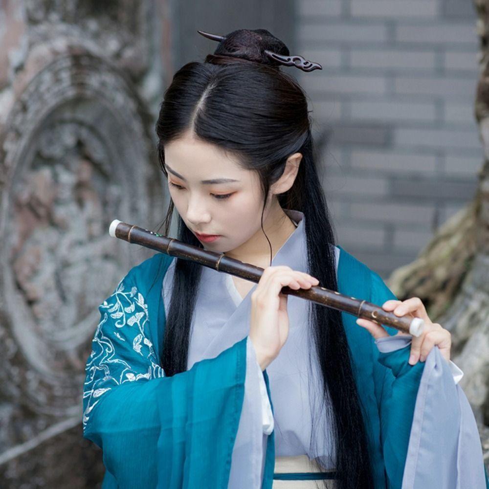 

Традиционная китайская флейта ручной работы Китайская бамбуковая флейта Чэнь Цин Детская фотография