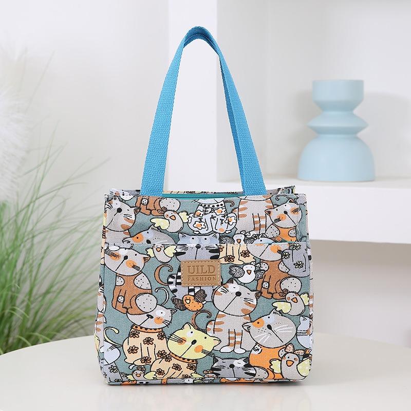 New canvas fashionable and lightweight handbag, hand carry to go to work, bring rice, lunch bag, aluminum foil insulation layer, lunch box bag