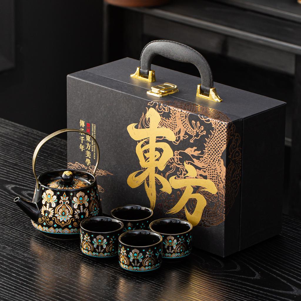 Oriental Guochao gold and silver wrong black pottery lifting beam pot tea set gift box gift tea pot one pot four cups lo