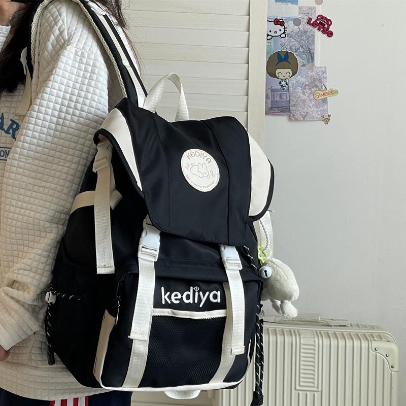 Large capacity backpack, new college student schoolbag, leisure travel nylon backpack.