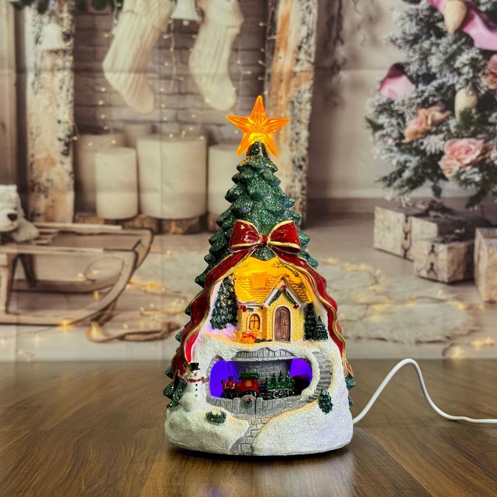 Juldekorationer, glödande musik, julgransbordsdekorationer, snöhusspeldosor, julklappar
