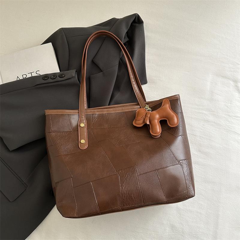 

2025 spring and summer new large-capacity women s bags feeling splicing contrasting color tote bags texture versatile portable shoulder bags women