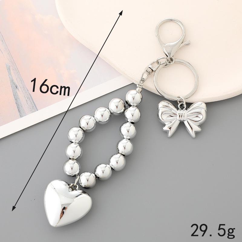 New Pearl Bow Beaded Pendant Phone Case Charm Wrist Strap Lanyard