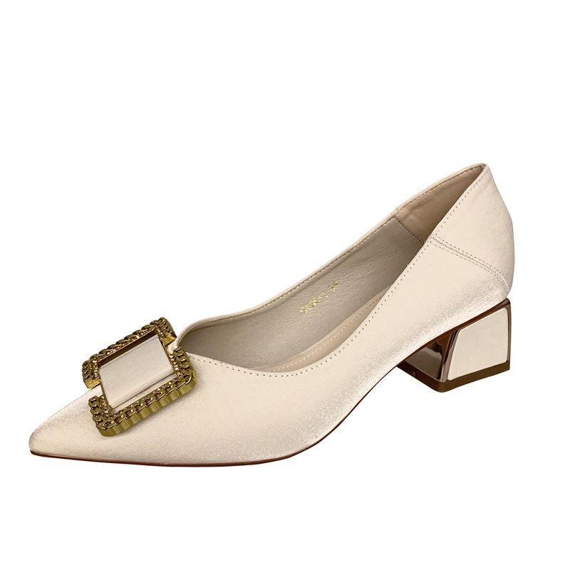 

Korean version of pointed metal buckle high heels 2025 spring and summer new thick heel single shoes women s elegant shallow mouth middle heel women s 39