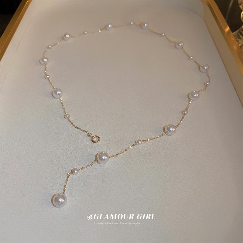 Simple long pearl necklace fashion ins design sense collarbone chain Y type personality temperament versatile item decoration