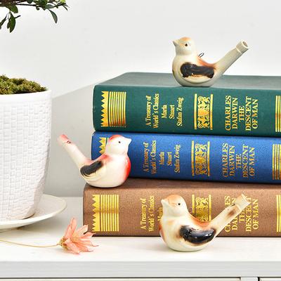 Niedliche farbige Zeichnung Wasservogel Pfeife Schwalbe Spielzeug Musikinstrument Souvenir