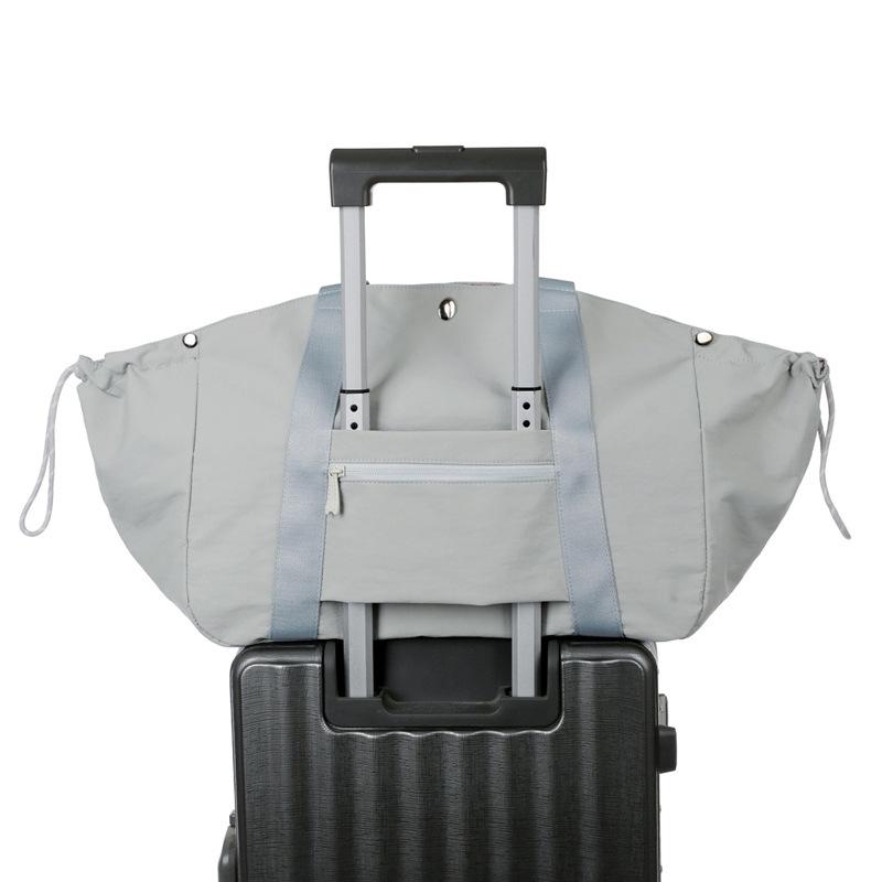 Trendy outdoor tennis bag, large capacity, detachable badminton sports bag, can be attached to a trolley, simple hand-held travel bag