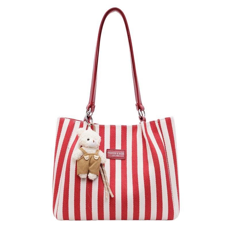 Niche fashion striped large-capacity commuter bag women's new versatile shoulder bag portable tote bag