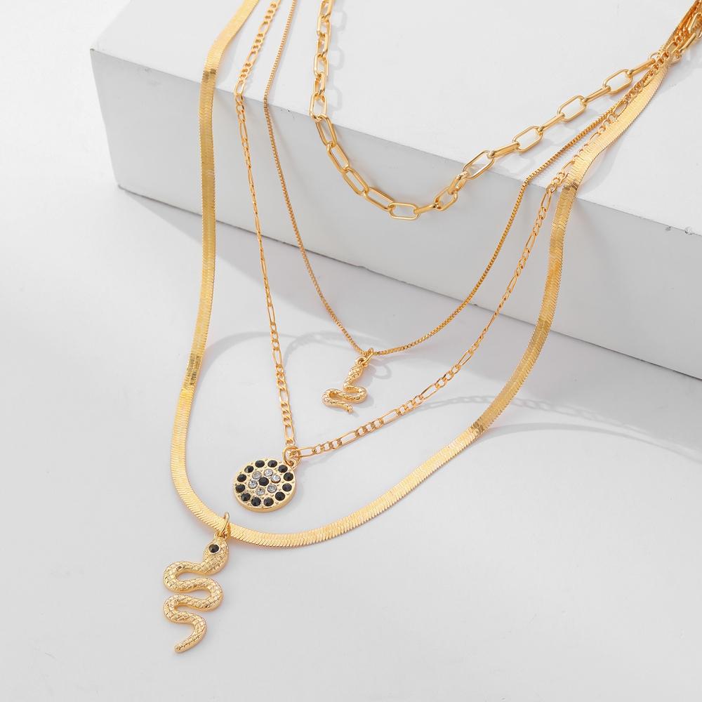 Four Piece Snake Necklace Women's Fashion Hollow Out Necklace Personality Bohemian Sweater Chain Elegant Snake Pendant