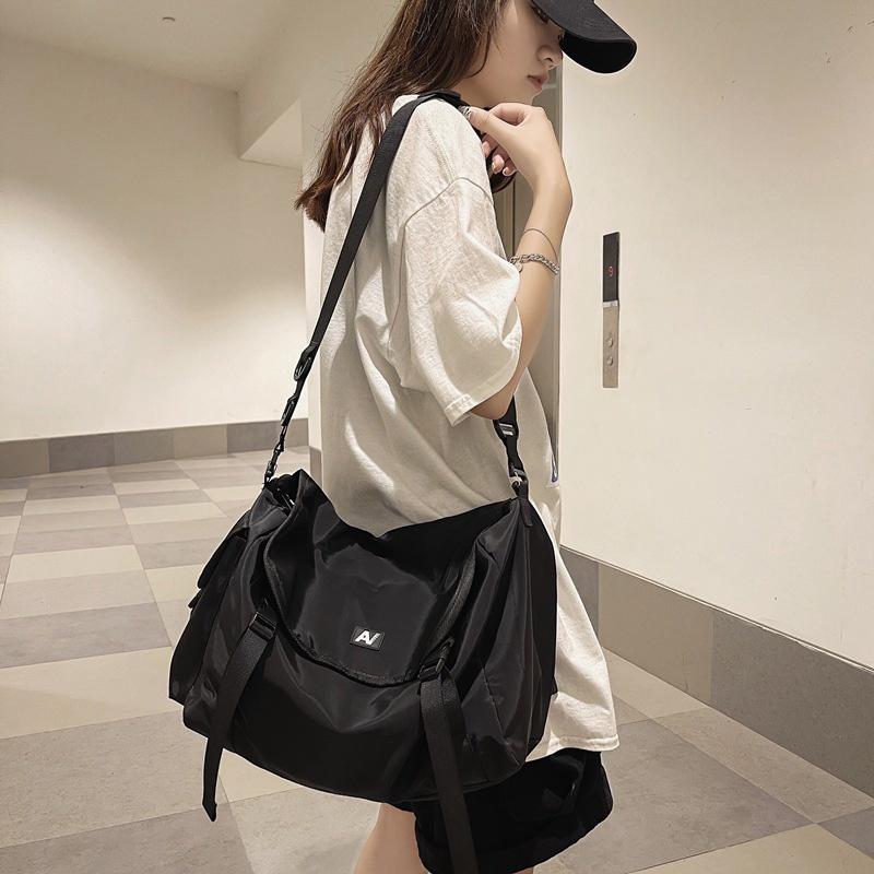 Stylish Street Fashion Crossbody Bag For Men And Women Trendy Nylon Material Breathable Letter Pattern Black Color