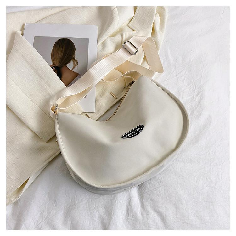 

Urban Chic Mini Canvas Bag For Women 2023 Spring New Fashionable Nylon Cloth Crossbody Bag With Zipper Closure OffWhite
