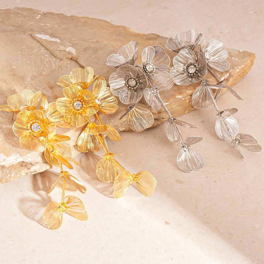 Metallic diamond-encrusted flower petals fringed silver needle earrings personalized vacation style temperament earrings