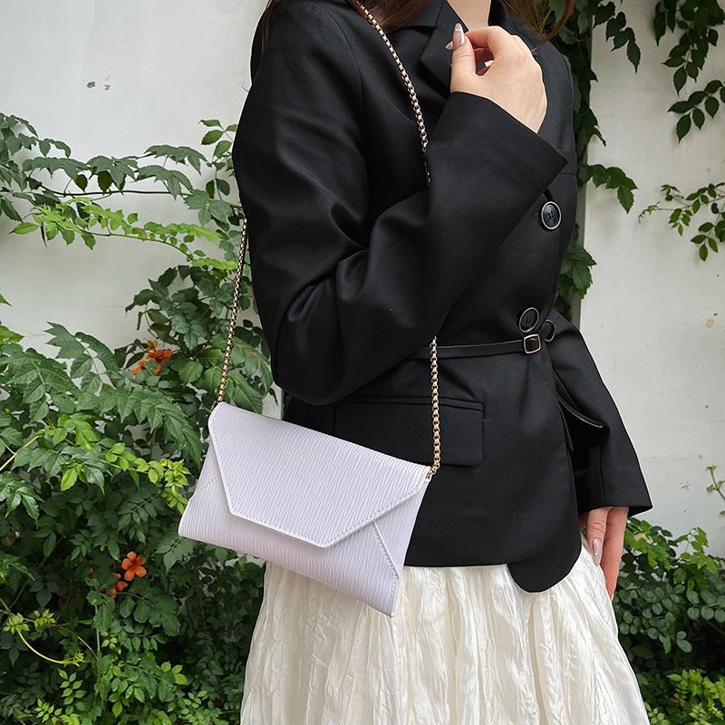European and American fashion pleated hand-held envelope bag, dinner bag, foreign style personalized chain, single shoulder oblique span women's bag
