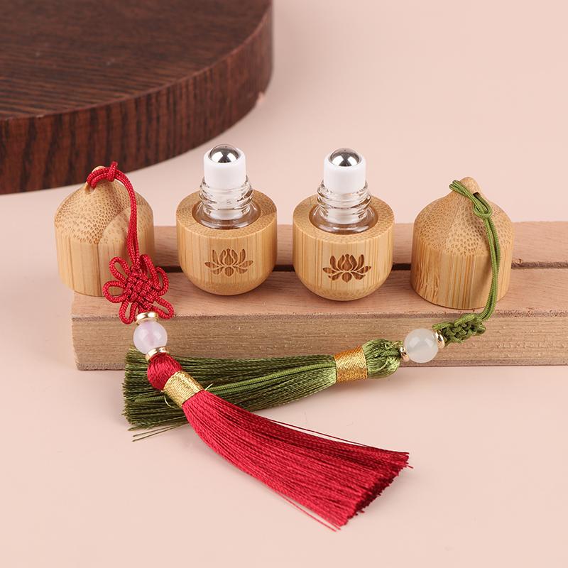 1 ml Bambusroller Leere Flasche Hautpflegebehälter Antiker Stil Roll-on-Flaschen Kleine Parfüm Ätherisches Öl Mit Anhänger
