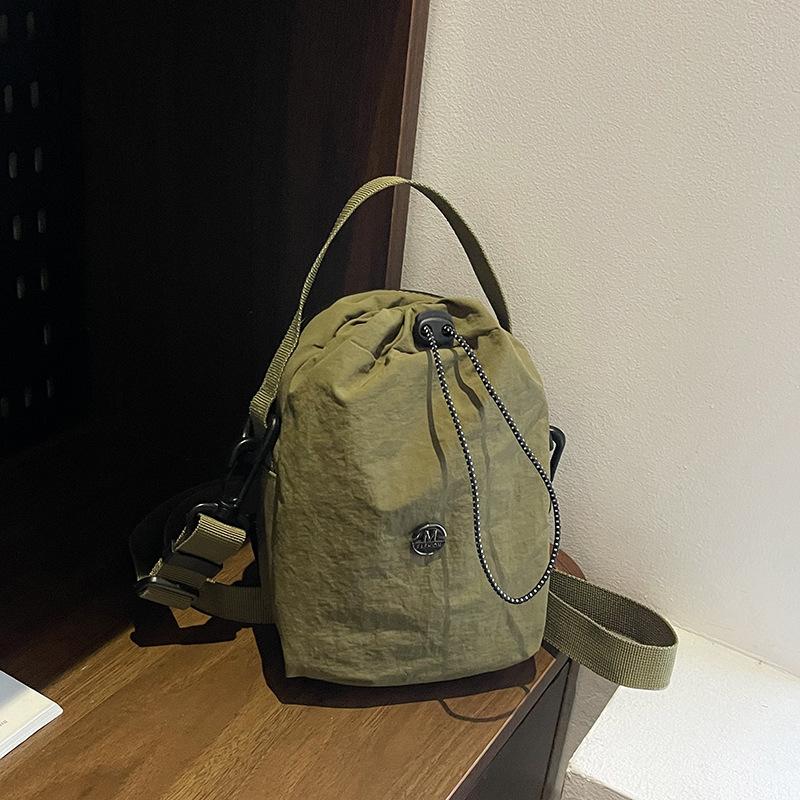 Kettle bag waterproof casual shoulder bag women's tide brand versatile mobile phone bag fitness walking messenger bag water cup cloth bag men