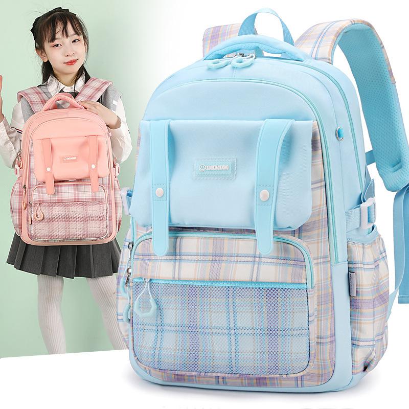 New schoolbag for primary school students, plaid load-reducing ridge backpack, anti-splashing water and wear-resistant canvas backpack, fashionable.
