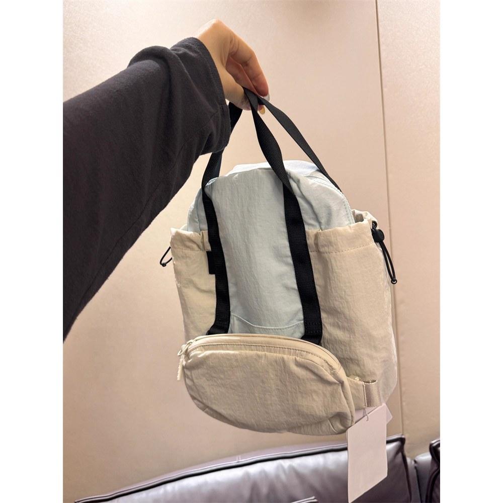 

Simple shoulder bag women s 2025 new canvas messenger bag large capacity mobile phone bag men s and women s commuting three-layer bag