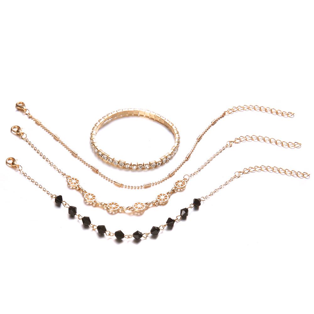 Braccialetto caviglia cavigliera cavigliera in lega alla moda multistrato incastonato di diamanti piccolo fresco set da 4 pezzi da donna