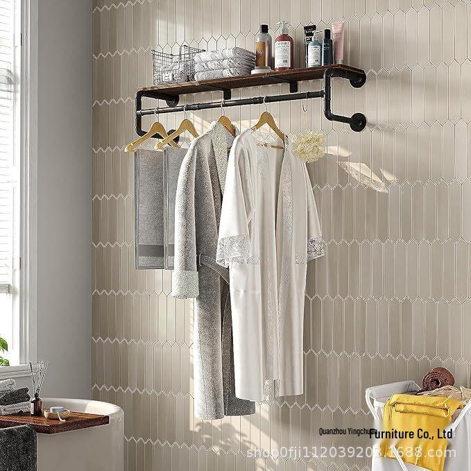 Industrial Style Wall-Mounted Clothing Display Rack with Water Pipe Design