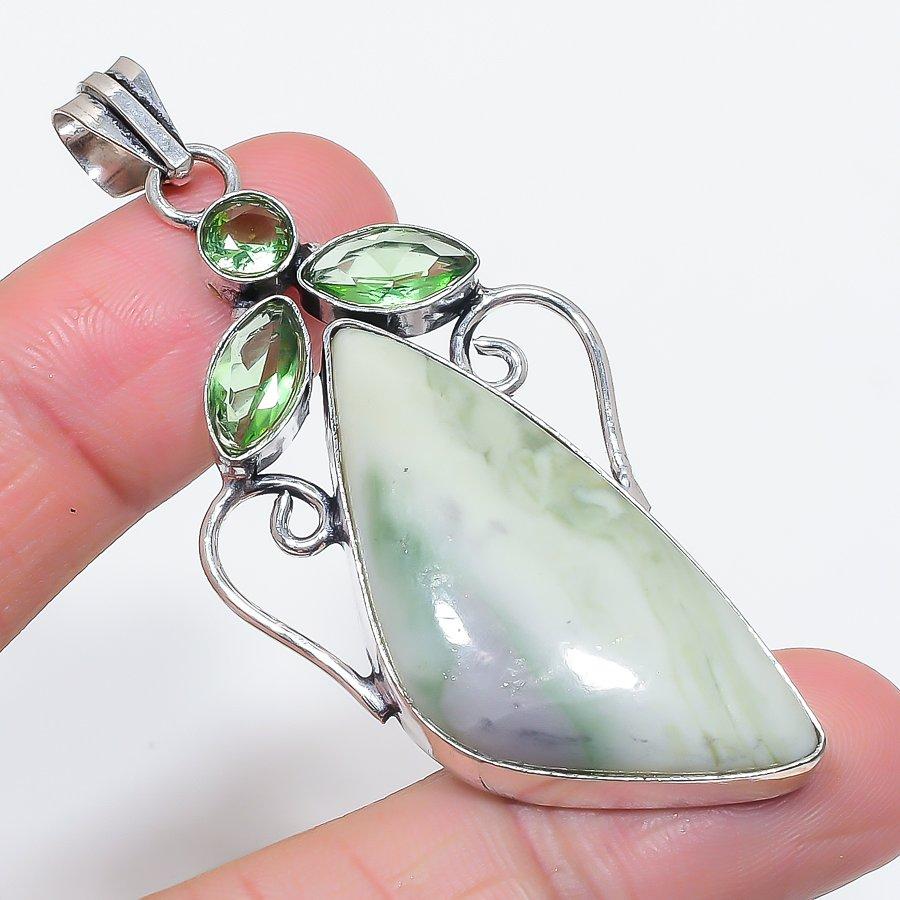 

Натуральный швейцарский зеленый опал, цаворит, подвеска из стерлингового серебра 925 пробы 2,76 o0C37