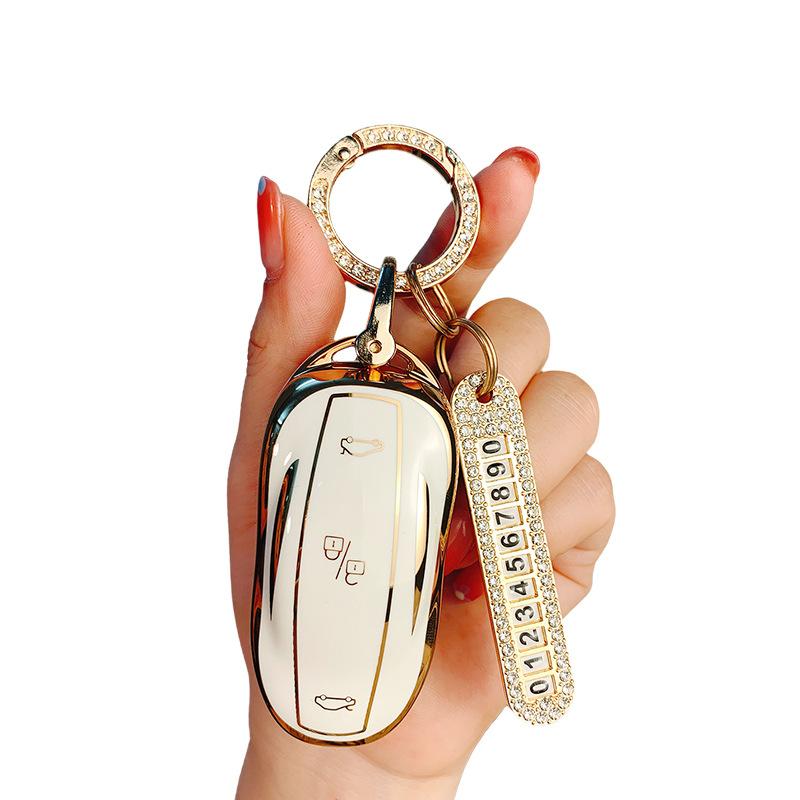 Suitable for Tesla Model 3 key cover ModelY/S/X high-end protective case, car supplies, bag buckle, men and women