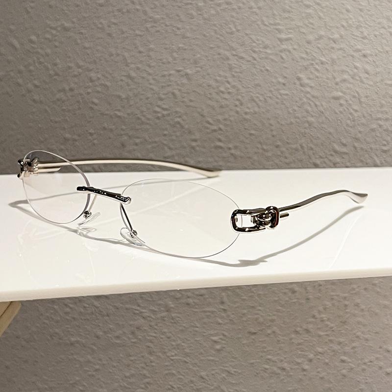 New elliptical frameless metal temple YK knot women's sunglasses personalized street shot Internet celebrity sunglasses
