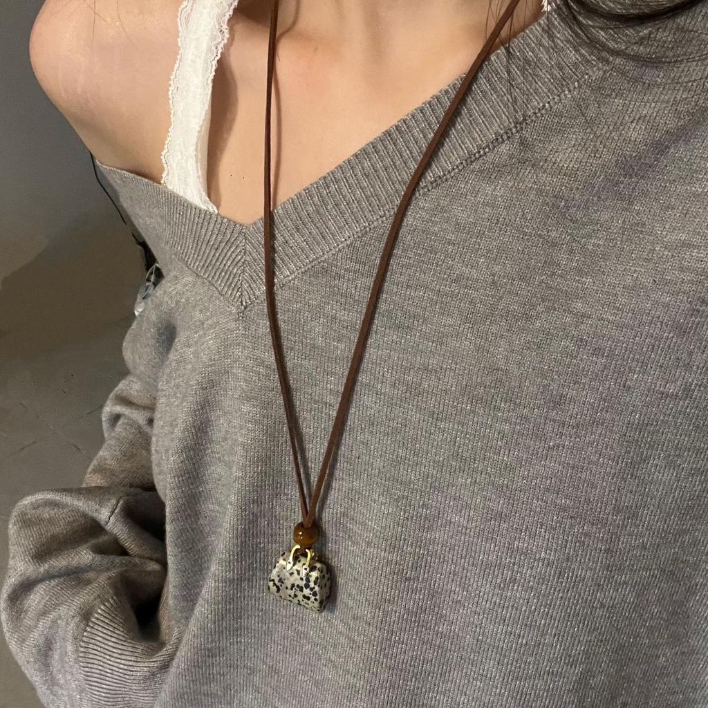 Colored artificial stone bag, wood beads, leather necklace, personalized creative design, sweater chain, Korean ins style necklace.