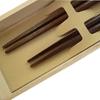 A pair of matching chopsticks featuring a golden owl presented in a paulownia wood A perfect gift for wedding anniversaries wedding Respect for the