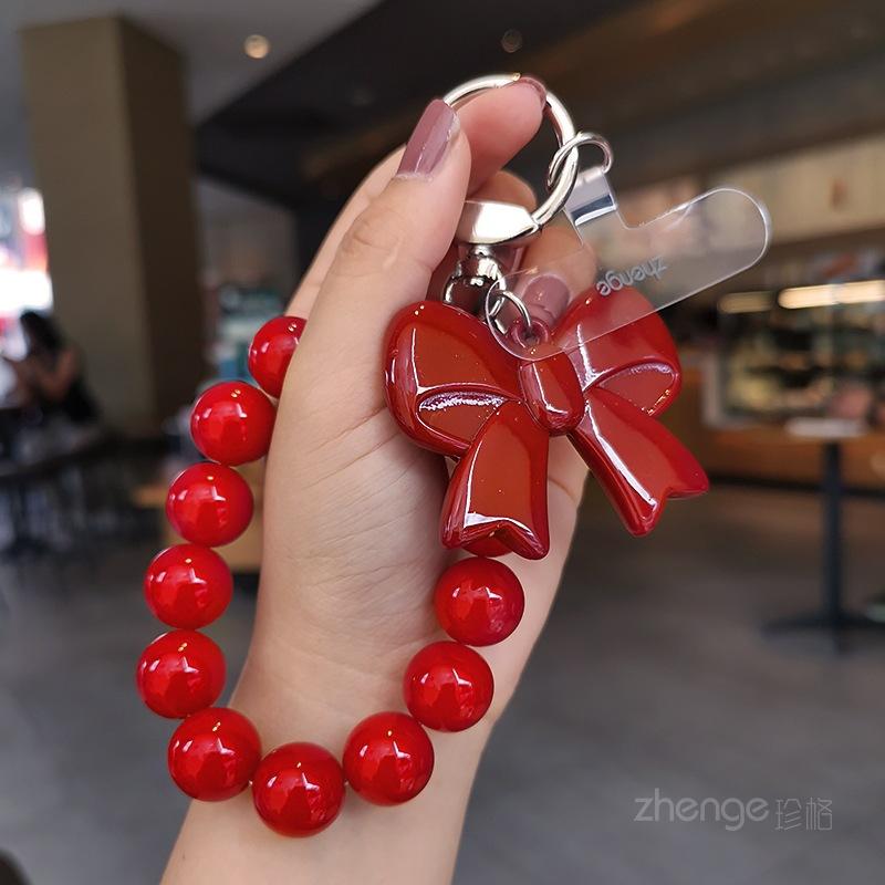 Butterfly love round bead mobile phone chain ins fashion women's hand chain wrist pendant bead pendant bag pendant