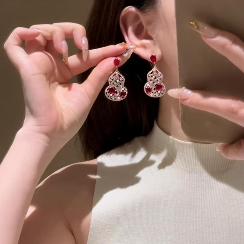 Silver needle ethnic style zircon empty gourd stud earrings new Chinese retro personality temperament earrings light luxury high-end earrings