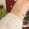 Armband med fyrklöver, pläterat med äkta guld på nysilver: Elegant, Mångsidig Design för Kvinnor