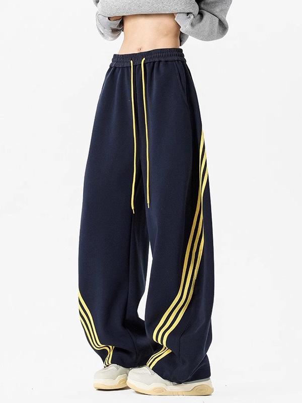 Pánské tmavě modré široké tepláky se třemi pruhy - Ležérní jarní high street trend