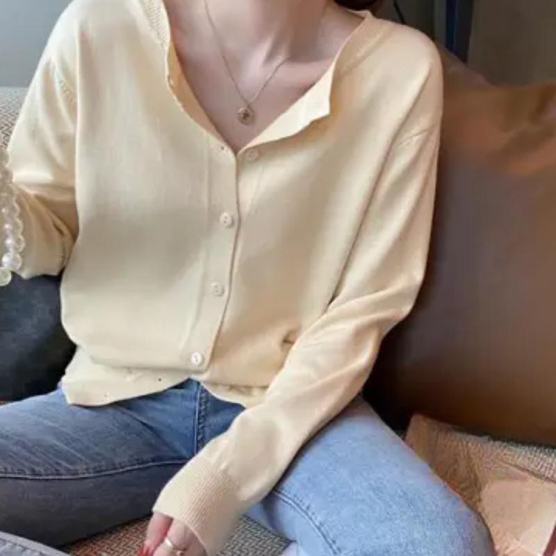 A New Style of Women's Knitted Cardigan Sweater Coat Paired with A Loose Top